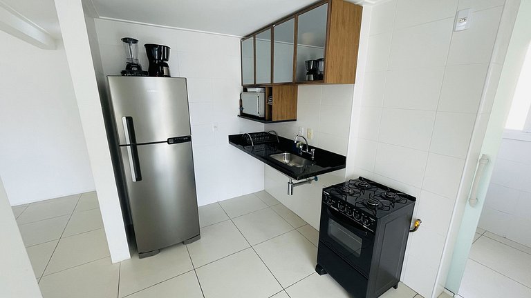 Apartamento com piscina e serviço de praia - Pitangueiras