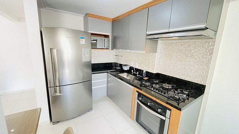 Apartamento com piscina e serviço de praia - Pitangueiras
